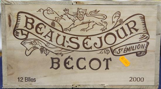 A case of twelve bottles of Chateau Beau-Sejour Becot, Saint Emilion, 2000, in original wooden case.